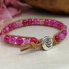 Pink agate and tan leather bracelet with lotus flower button fastener 