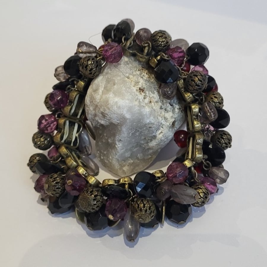 Beaded Bracelet, gorgeous red & black tones with statement metal filigree beads