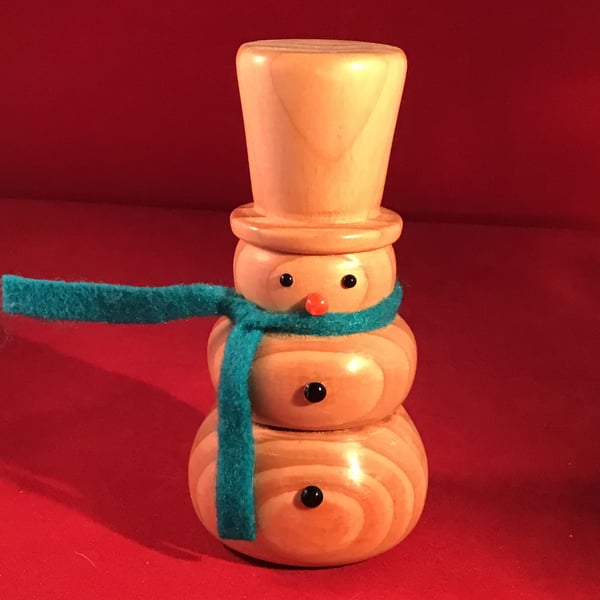 Natural wood snowman.