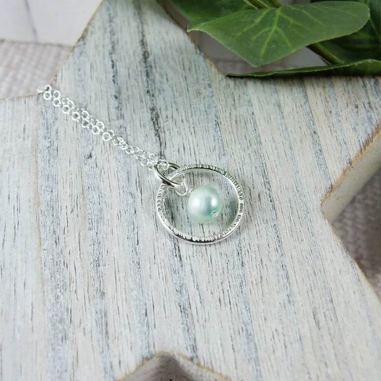 Silver Circle Necklace with Pastel Green Pearl