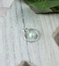 Silver Circle Necklace with Pastel Green Pearl