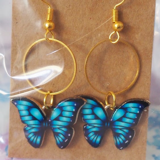 Gold Earrings with Blue Butterfly Charms and Small Circles 