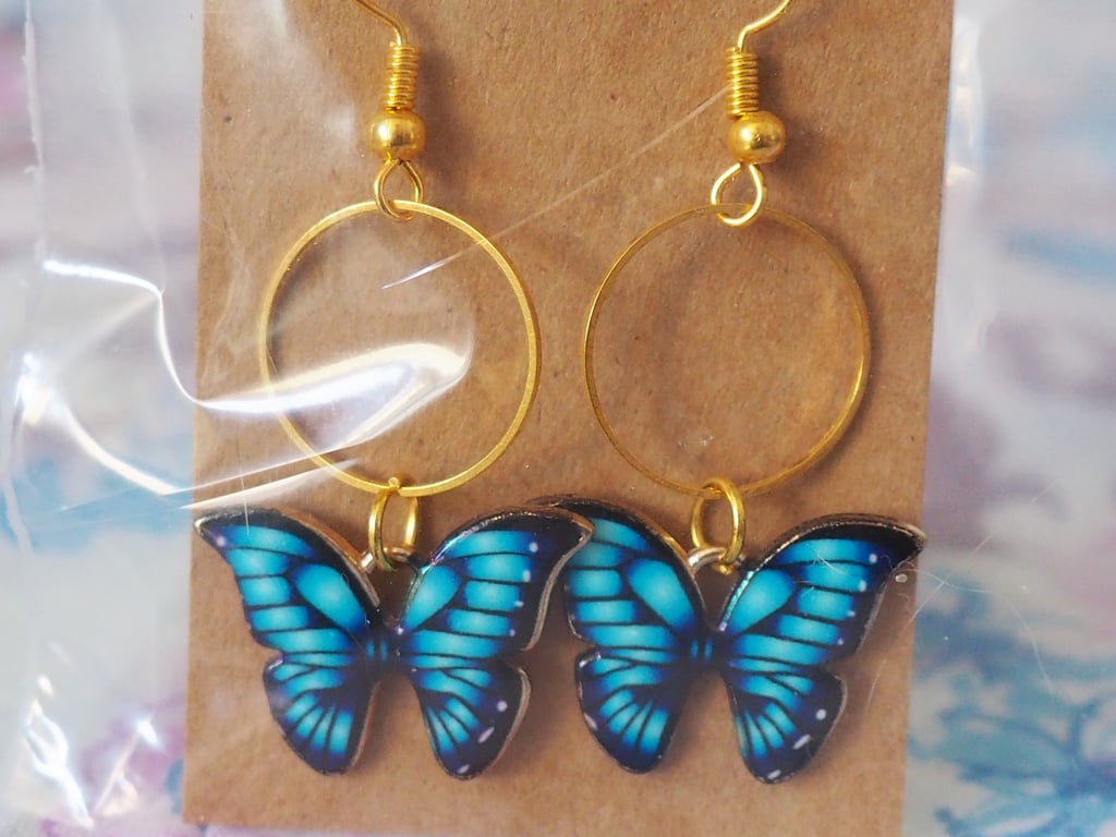 Gold Earrings with Blue Butterfly Charms and Small Circles 