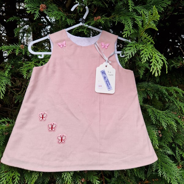 Age: 3-6m Pink Butterfly Motif Needlecord Dress 