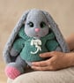     Handmade Crochet Amigurumi Bunny – Silver Grey with Turquoise Hoodie - Image 3