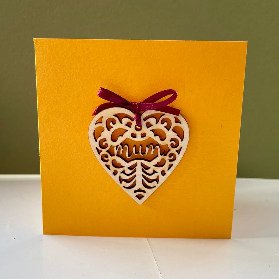Blank card with detachable wooden 'Mum' heart decoration