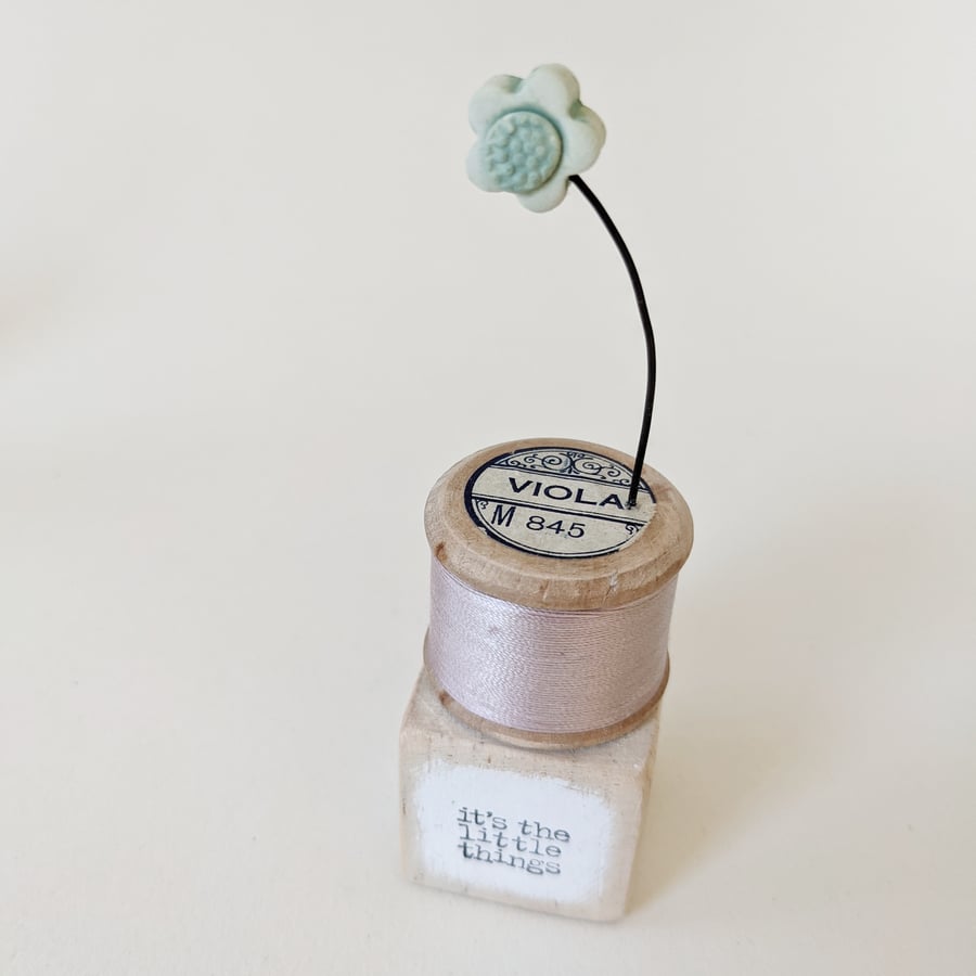 Clay Flower on a Teeny Vintage Bobbin 'it's the little things'