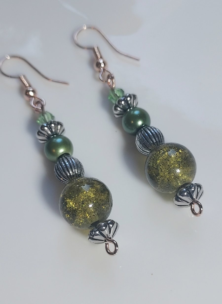 Hypoallergenic drop earrings with green beads
