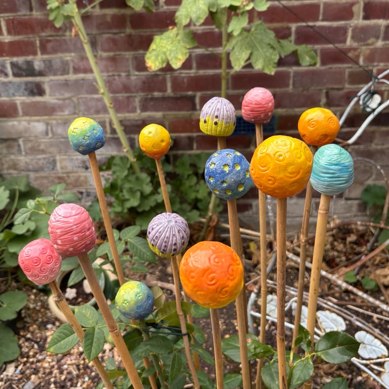 Set of three garden cane toppers