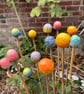 Set of three garden cane toppers