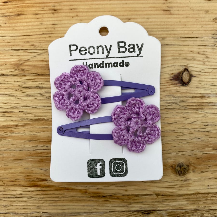 Girl’s purple flower hair clips