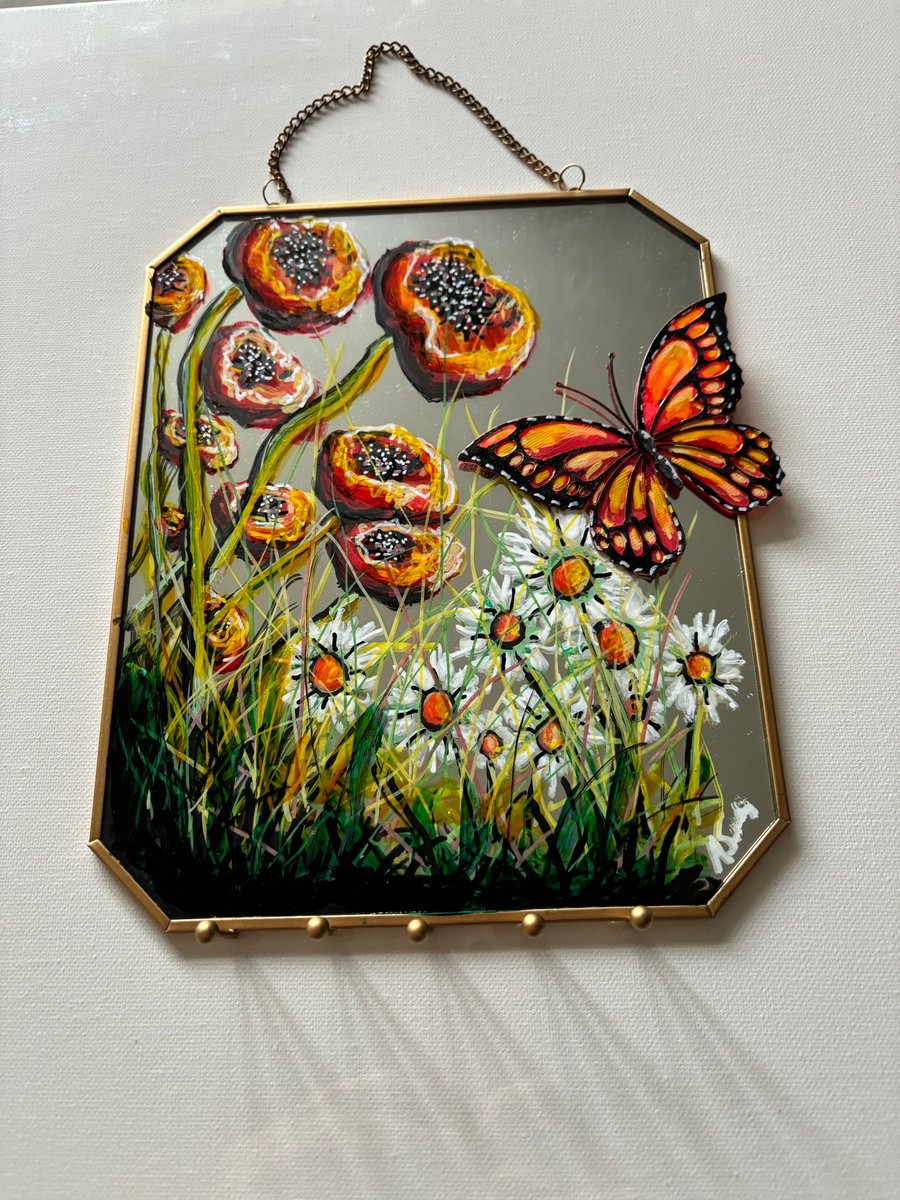 A hand painted and fired mirror by Andrew Jenkins 