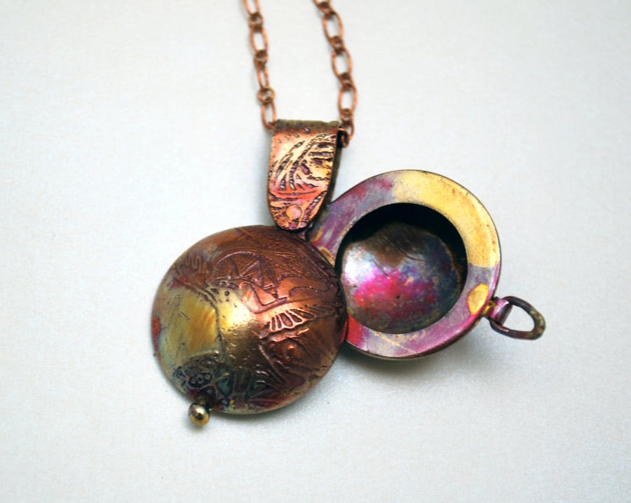 copper swivel owl locket