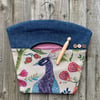 Peacock and denim peg bag
