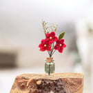 Trio of miniature felted flowers in glass bottle vase (red)