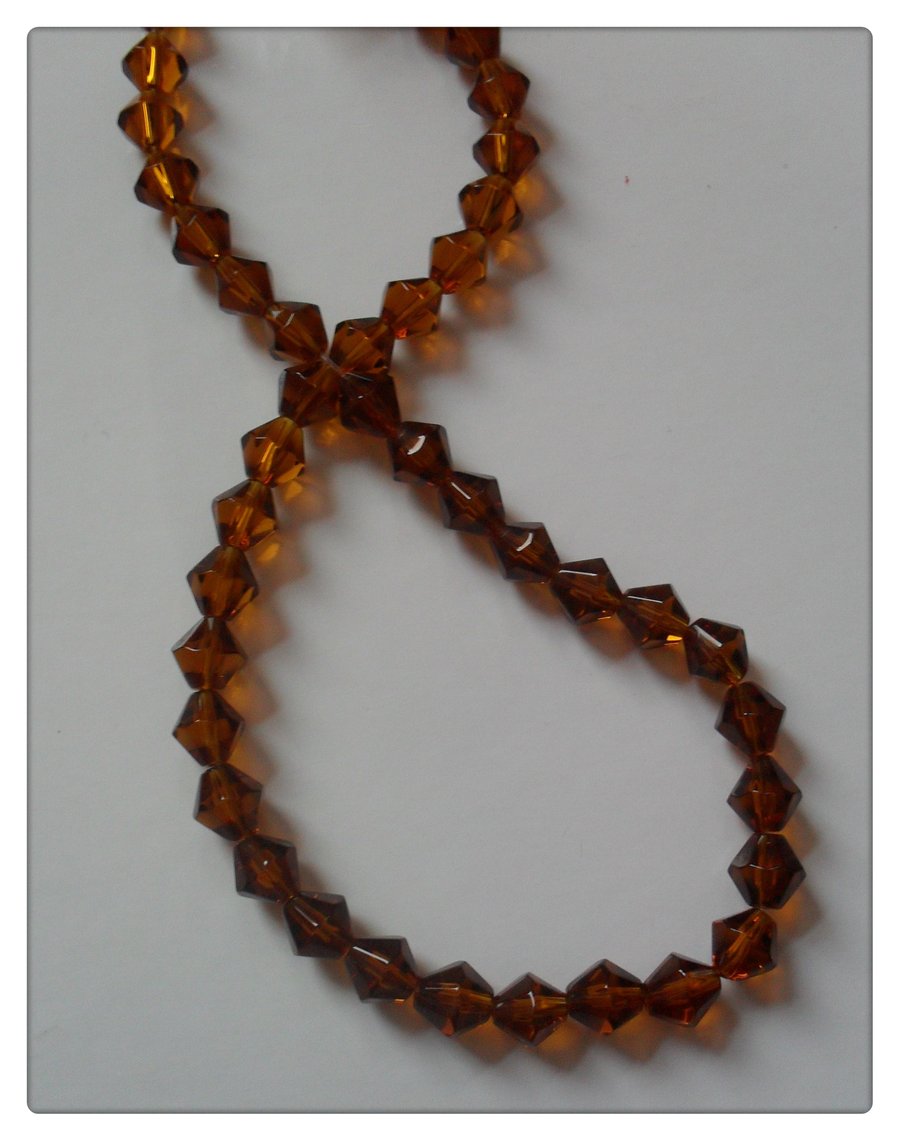 50 x Glass Beads - Bicone - 8mm - Amber 