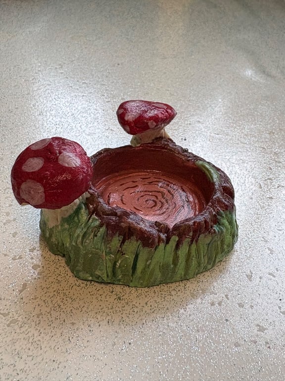 Handmade clay tree stump and mushroom tea light holder