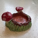 Handmade clay tree stump and mushroom tea light holder