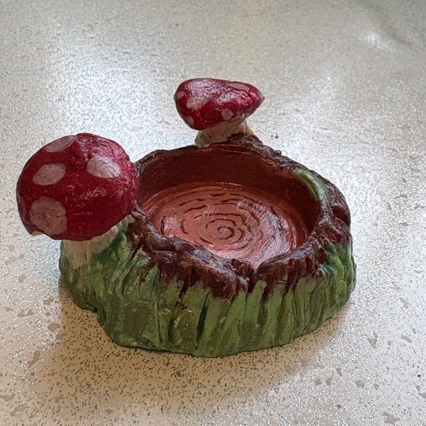Handmade clay tree stump and mushroom tea light holder