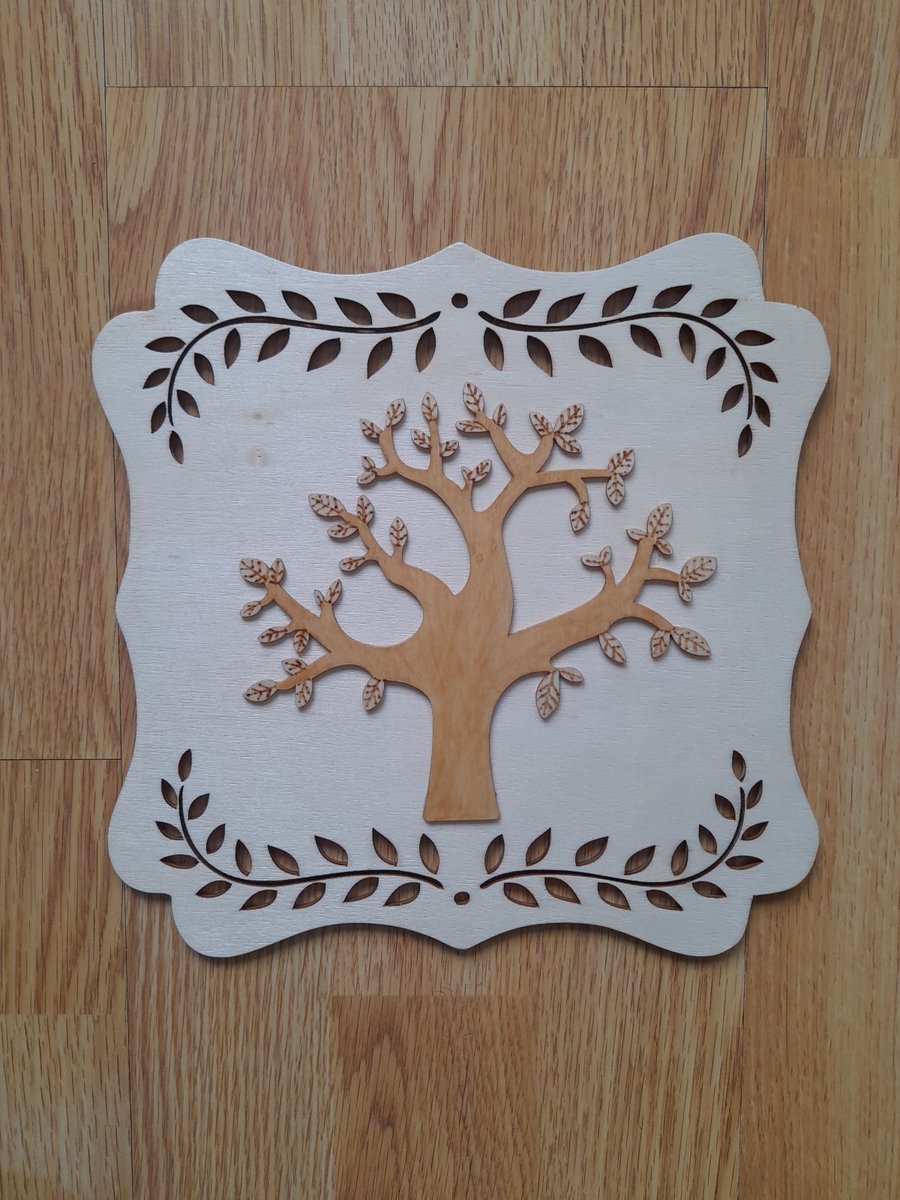 Wooden Tree of Life Wall Decor: Engraved Plywood Art. Spring decoration.