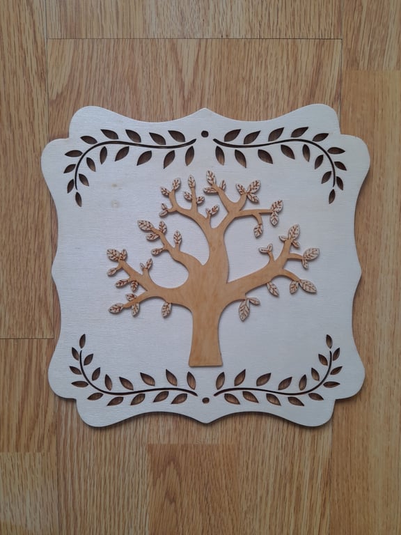 Wooden Tree of Life Wall Decor: Engraved Plywood Art. Spring decoration.