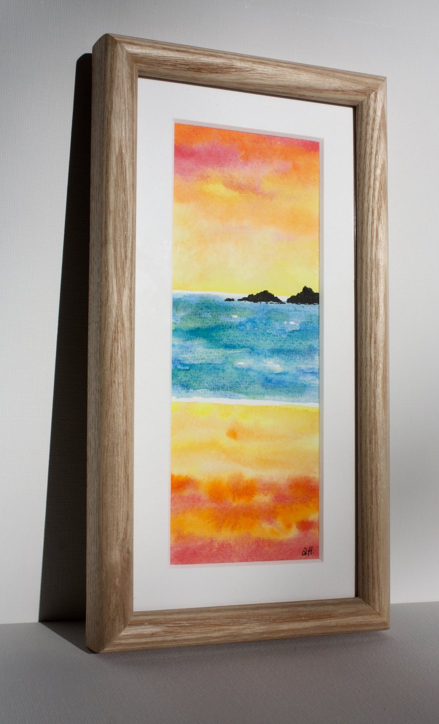 CORNISH SUNSET WATERCOLOUR IN ASH FRAME