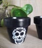 Pair of small terracotta plant pots hand drawn with decorative skulls.   - Image 3