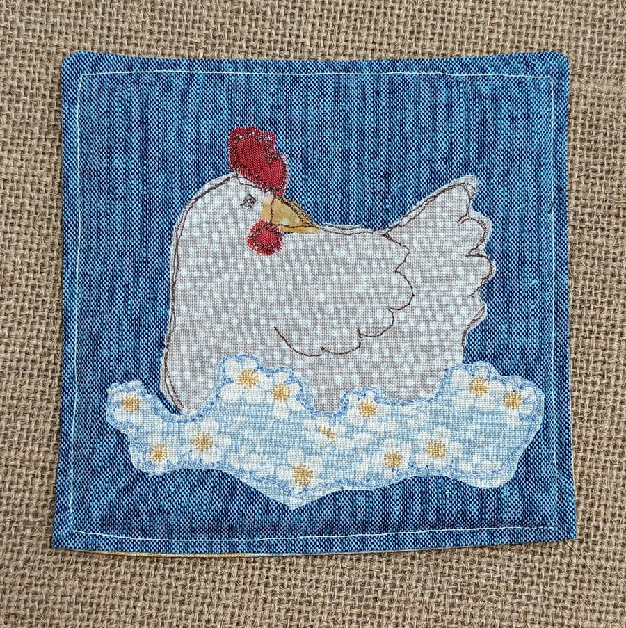 Nesting hen fabric coaster (right facing)