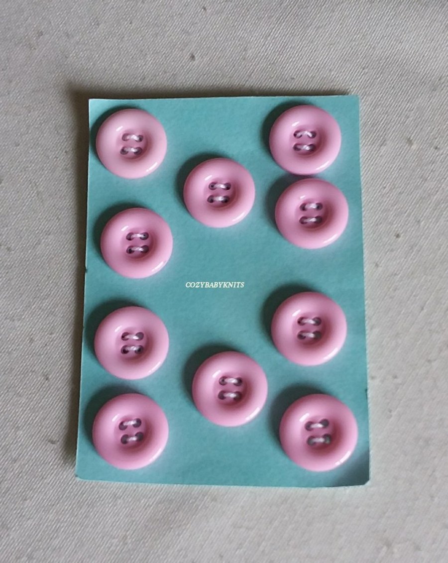 18mm Pale pink round buttons with four holes for attaching 