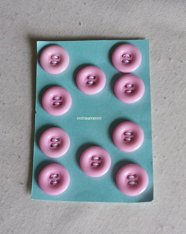 18mm Pale pink round buttons with four holes for attaching 
