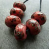 coral frit lampwork glass beads