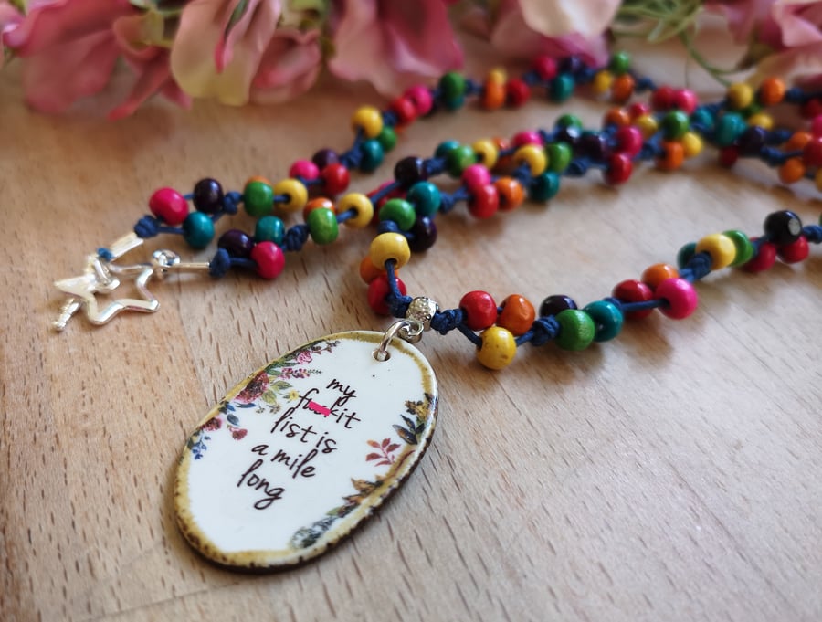 "F-it List" wooden rainbow bead necklace with ceramic pendant, sweary
