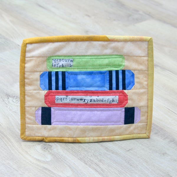 'Stack of Books' patchwork Fabric Mug Rug