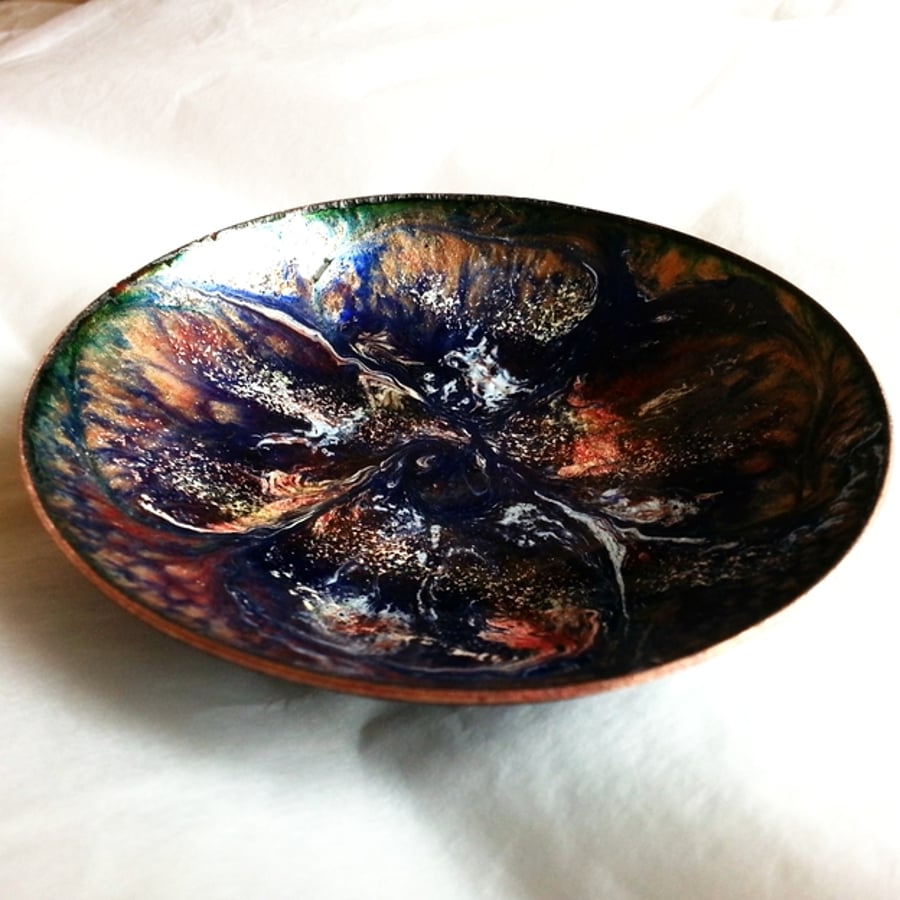 Enamel dish -scrolled white,gold,red on blue over clear enamel