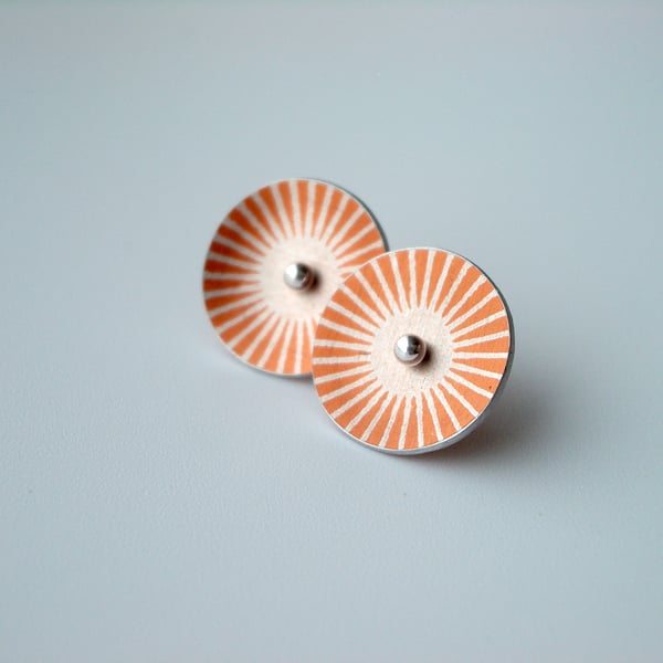 Orange and silver sunburst circle studs