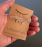 Five white sea glass stitch markers - Image 6