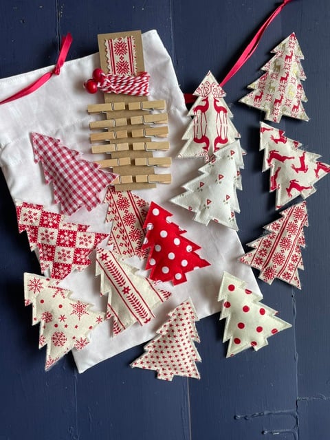Twelve Trees of Christmas fabric garland - cream and red