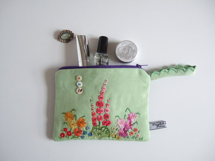 Make up bag, cosmetics bag, or purse, made from floral vintage embroidery.