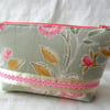 Green and pink floral print make-up bag. Cosmetic bag. 