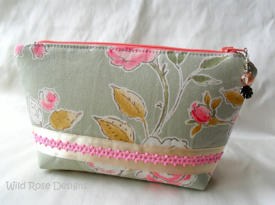 Green and pink floral print make-up bag. Cosmetic bag. 
