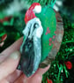 Christmas tree decoration of a Badger with a santa hat made from air dry clay.   - Image 5