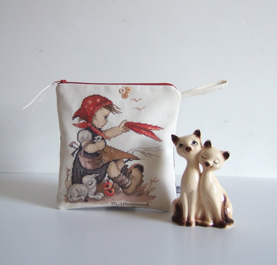 Make up bag or purse with a spring lamb and child in vintage embroidery