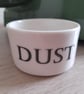 Porcelain vessel with 'dust' wording