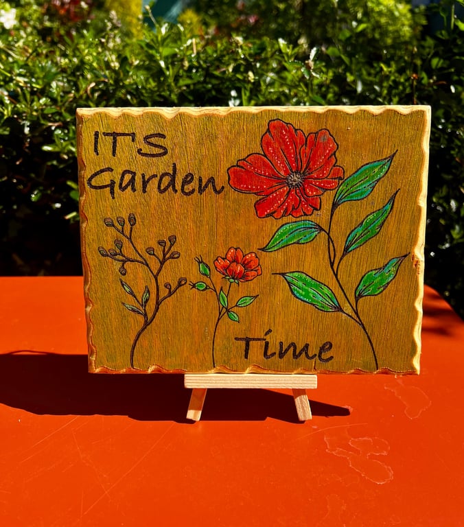 It's Garden time. Wooden sign. 
