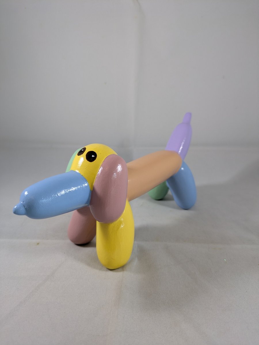 Ceramic Rainbow Pastel Balloon Dachshund Sausage Dog Animal Figurine Ornament.