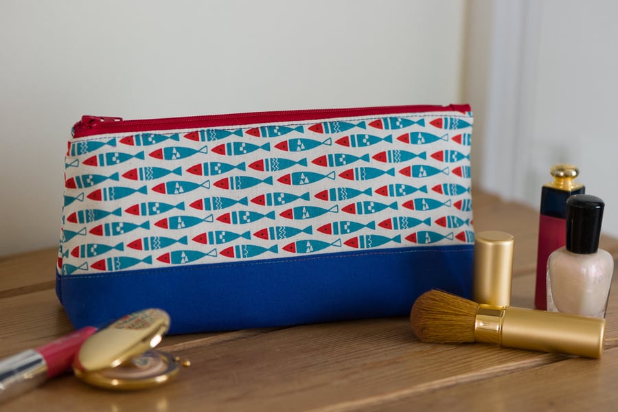 Zip pouch in a really useful size featuring a Scandi style fishes print