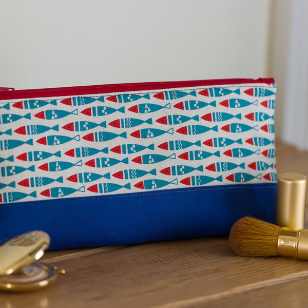 Zip pouch in a really useful size featuring a Scandi style fishes print