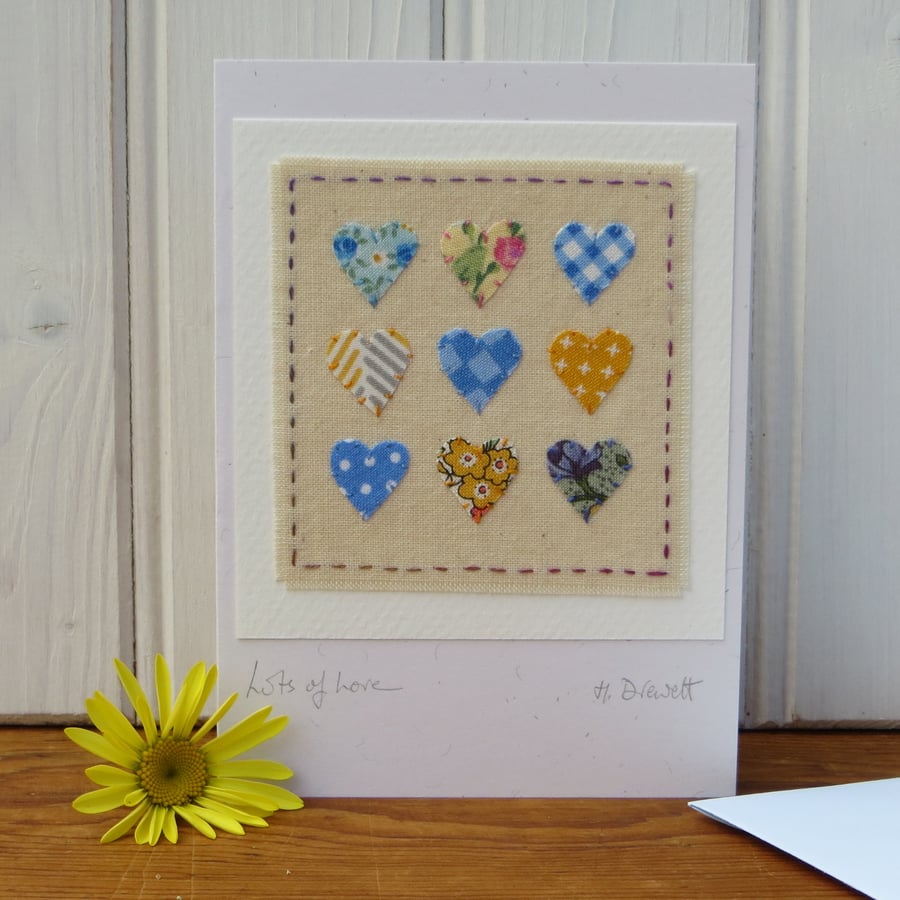 Miniature hand-stitched bright applique hearts - entitled 'Lots of Love'