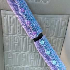 Pair of handknitted seatbelt covers