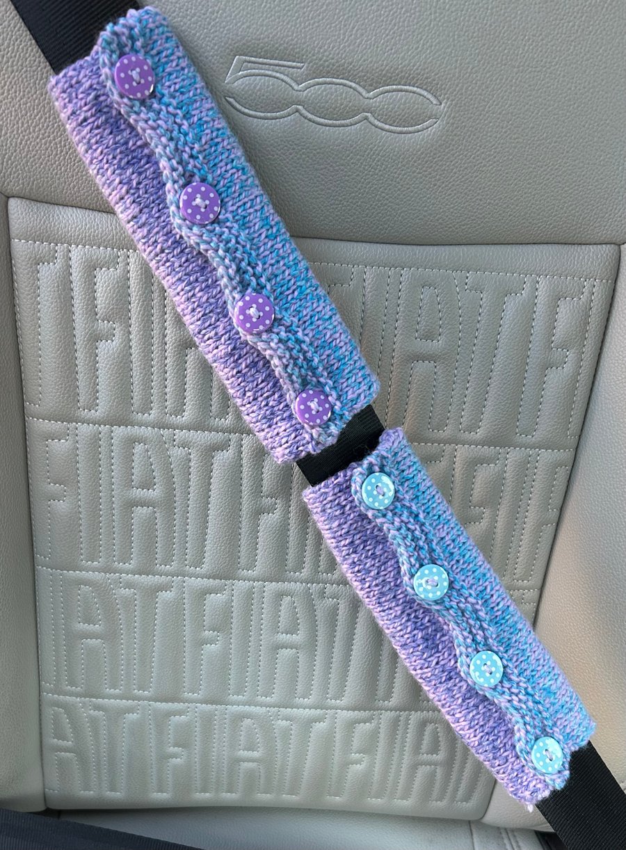 Pair of handknitted seatbelt covers